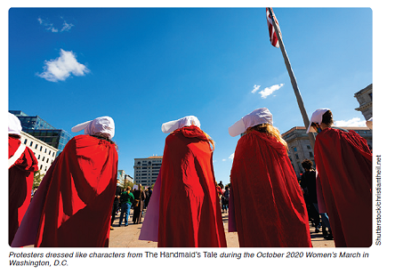 Protesters dressed like characters from The Handmaid's Tale during the October 2020 Women’s March in Washington, D.C.