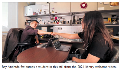 Ray Andrade fist-bumps a student in this still from the 2024 library welcome video.