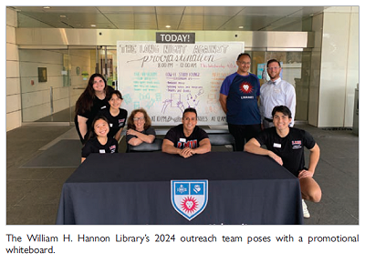 The William H. Hannon Librarys 2024 outreach team poses with a promotional whiteboard.